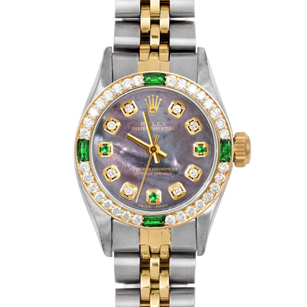 Brand : Rolex
Model : Oyster Perpetual 
Gender : Ladies
Metals : 14K Yellow Gold / Stainless Steel
Case Size : 24 mm

Dial : Custom Tahitian Mother Of Pearl Emerald Diamond Dial (This dial is not original Rolex And has been added aftermarket yet is