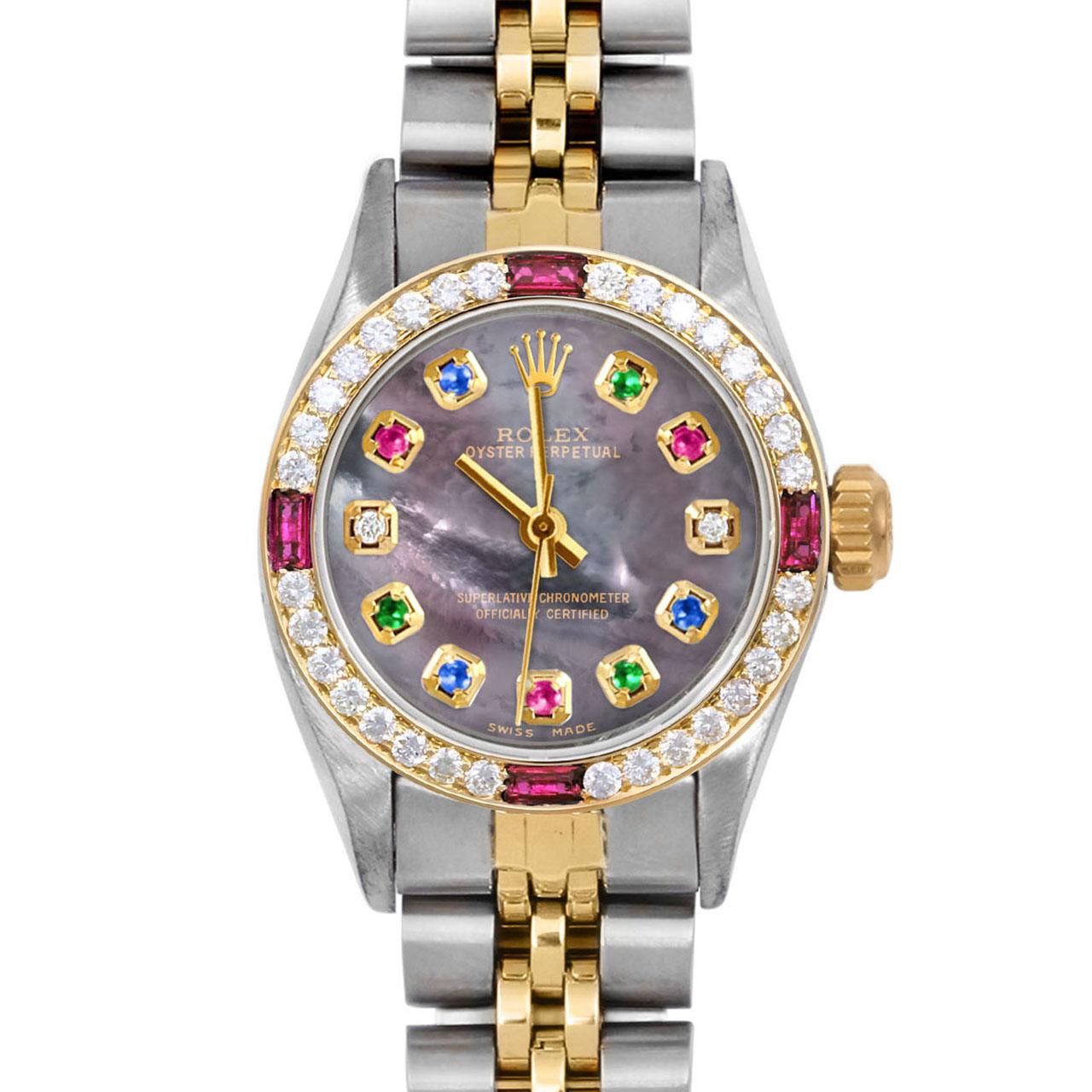 Brand : Rolex
Model : Oyster Perpetual 
Gender : Ladies
Metals : 14K Yellow Gold / Stainless Steel
Case Size : 24 mm

Dial : Custom Tahitian Mother Of Pearl Rainbow Emerald Ruby Sapphire Diamond Dial (This dial is not original Rolex And has been