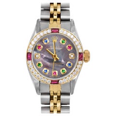 Rolex Montre Oyster Perpetual de Tahiti avec cadran arc-en-ciel et lunette en diamants et rubis