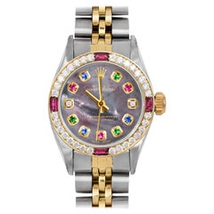 Rolex Lady Oyster Perpetual Tahitian Rainbow Diamond Dial Ruby Diamond Bezel