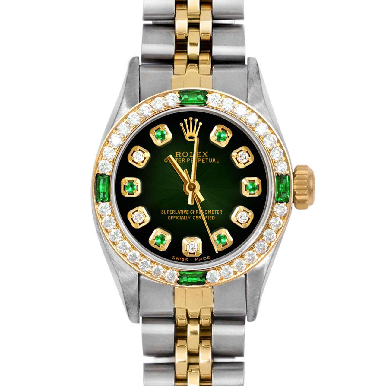 Brand : Rolex
Model : Oyster Perpetual 
Gender : Ladies
Metals : 14K Yellow Gold / Stainless Steel
Case Size : 24 mm
Dial : Custom Green Vignette Emerald Diamond Dial (This dial is not original Rolex And has been added aftermarket yet is a beautiful