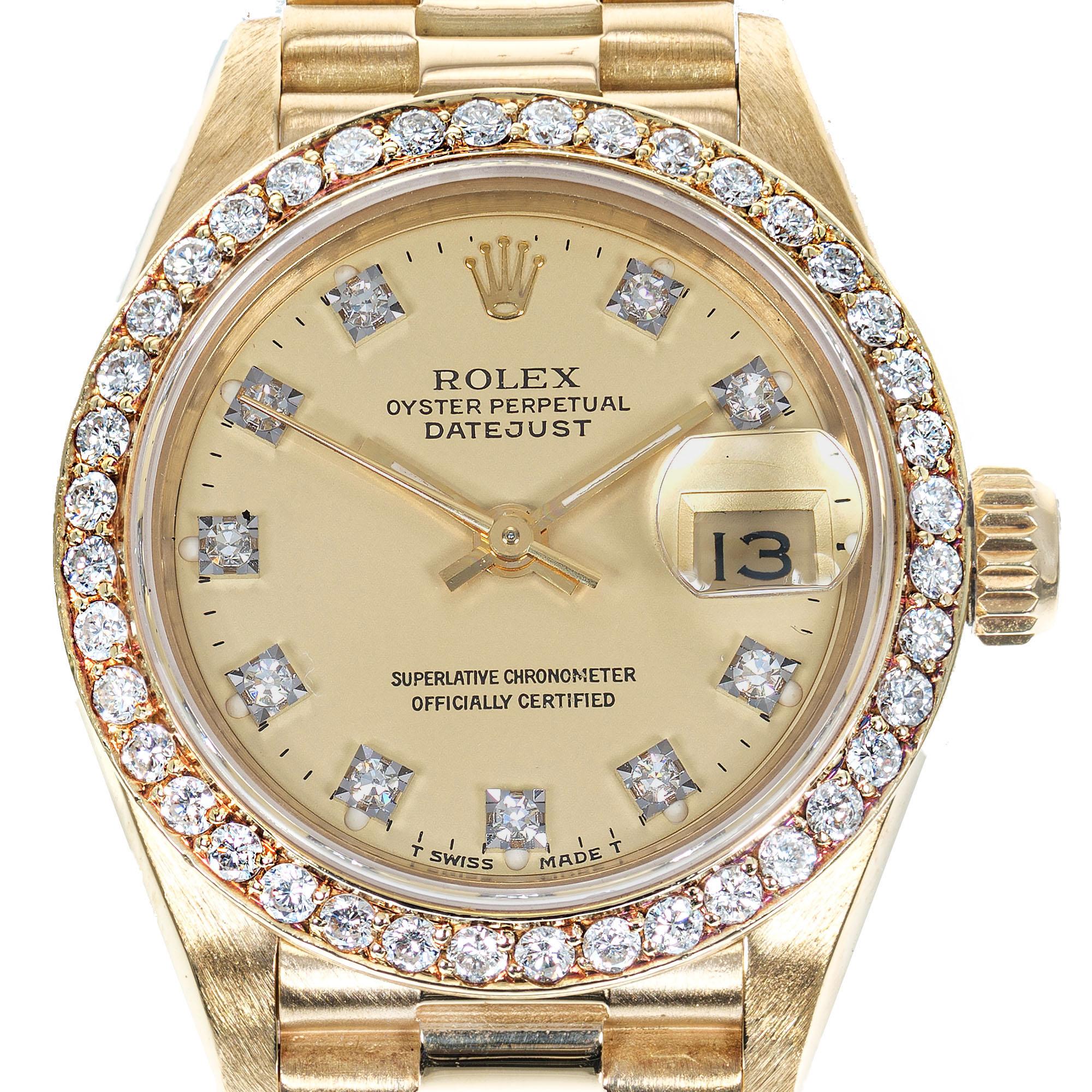 Rolex Lady's 18k Yellow Gold and Diamond Datejust Wristwatch Ref 69138, with gilt diamond halo dial, circa 1985. 6.75 inches. 

18k yellow gold
Length: 6.75 inches
Length: 32.87mm
Width: 26mm
Bracelet width at case: 13mm
Case thickness: