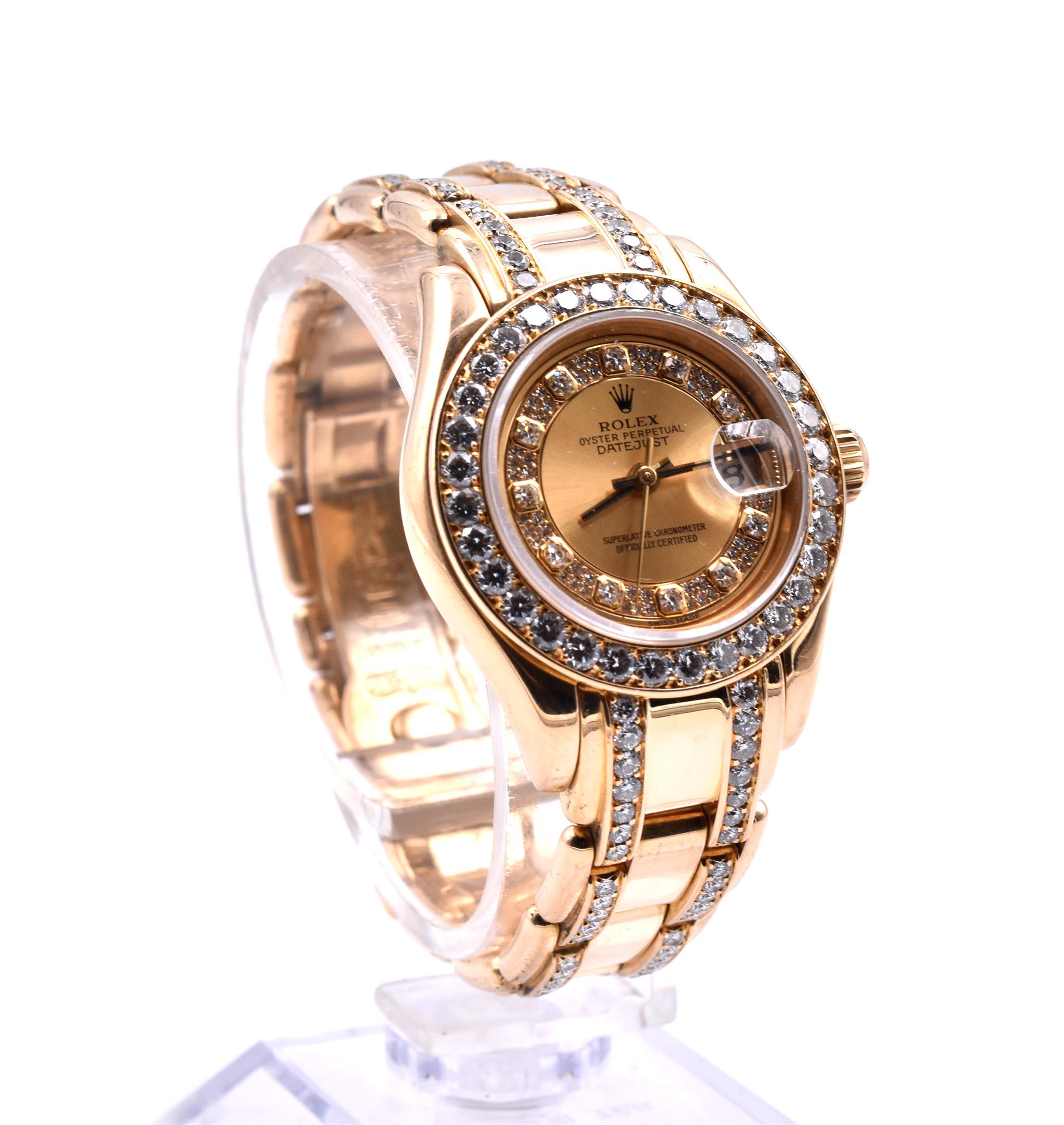 Movement: automatic 
Function: hours, minutes, seconds, date
Case: round 29mm 18k yellow gold case with factory diamond bezel, scratch resistant sapphire crystal, waterproof screw-down crown to 100 meters
Dial: champagne diamond dial with diamond