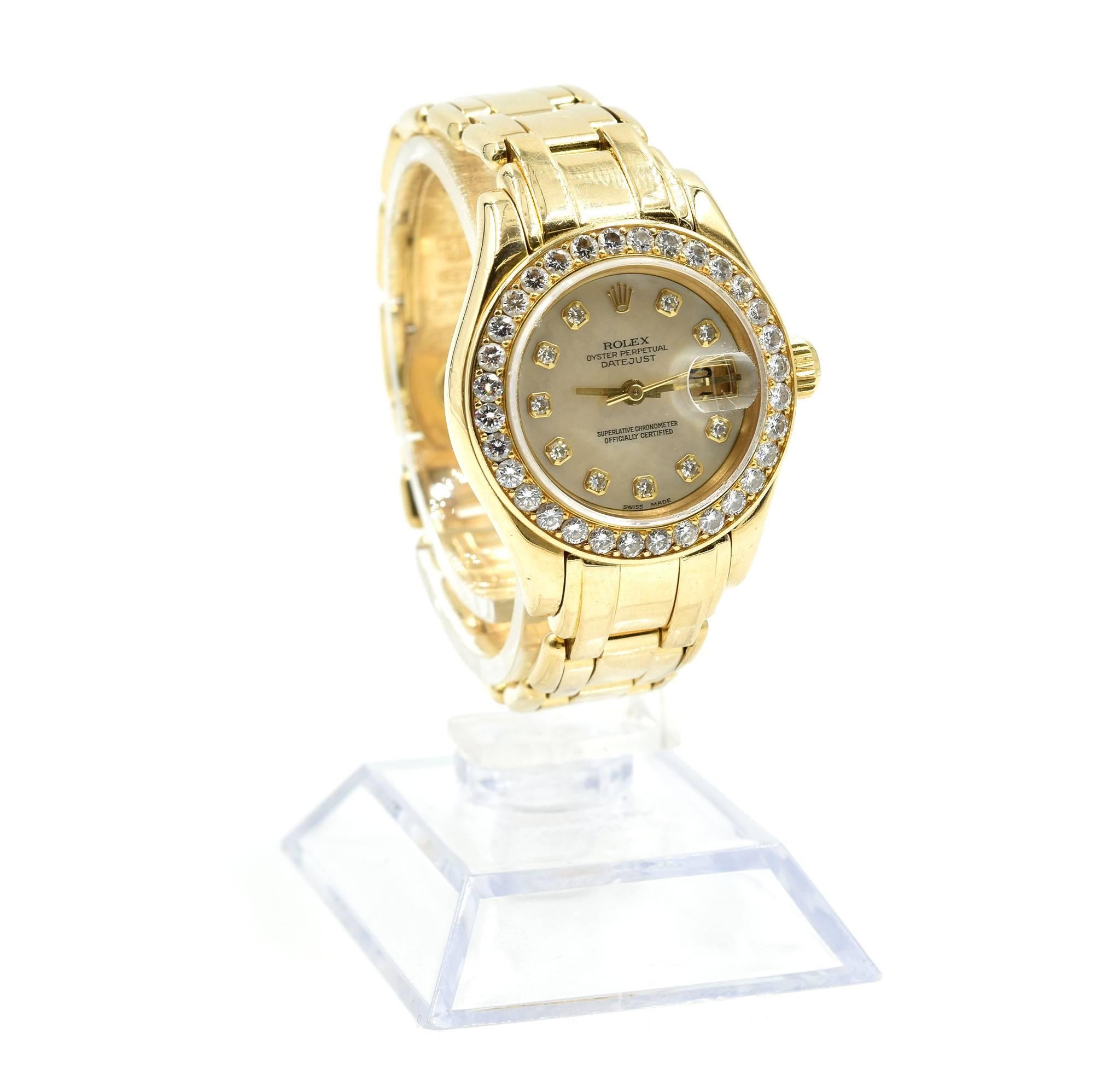 Movement: automatic 2235 movement
Function: hours, minutes, seconds, date
Case: round 29mm 18k yellow gold case with factory thirty-two diamond bezel, scratch resistant sapphire crystal, waterproof screw-down crown to 100 meters
Dial: factory mother