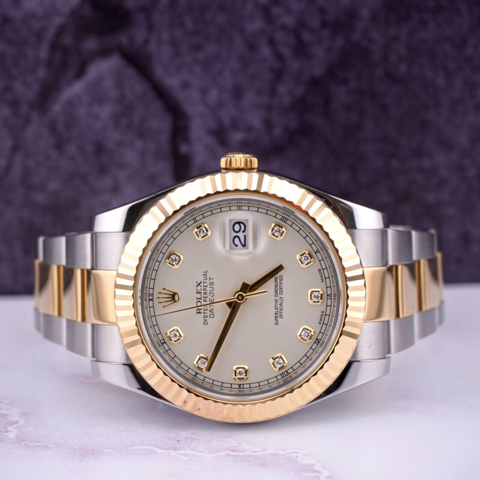 Rolex Datejust II 41mm Watch

Pre-owned w/ Original Box & Card
100% Authentic Authenticity Card
Condition - (GREAT Condition) - See Pics
Watch Reference - 116333
Model - Datejust ll
Dial Color - Ivory
Material - 18k Yellow Gold/Satinless Steel
Watch
