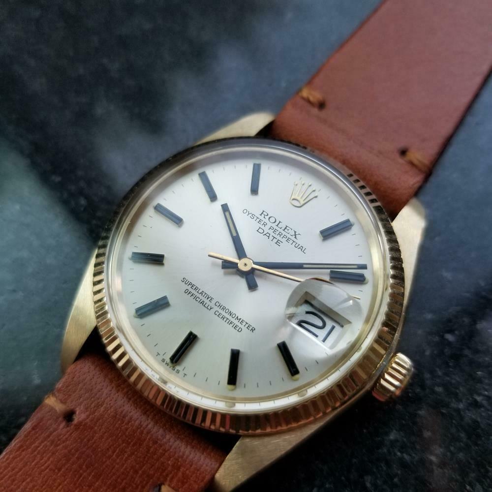 Luxurious icon, men's 14k solid gold Rolex Oyster Perpetual Date ref.1503 automatic, c.1978. Verified authentic by a master watchmaker. Gorgeous silver Rolex dial, applied black indice hour markers, black minute and hour hands, sweeping central