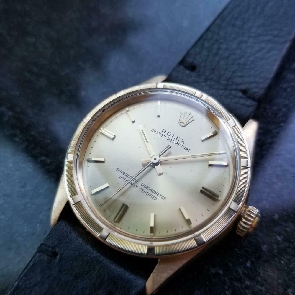 Timeless luxury, men's 18k solid gold Rolex Oyster Perpetual 1007 automatic, c.1967. Verified authentic by a master watchmaker. Gorgeous gold Rolex signed dial, applied gold indice hour markers, gold minute and hour hands, sweeping central second