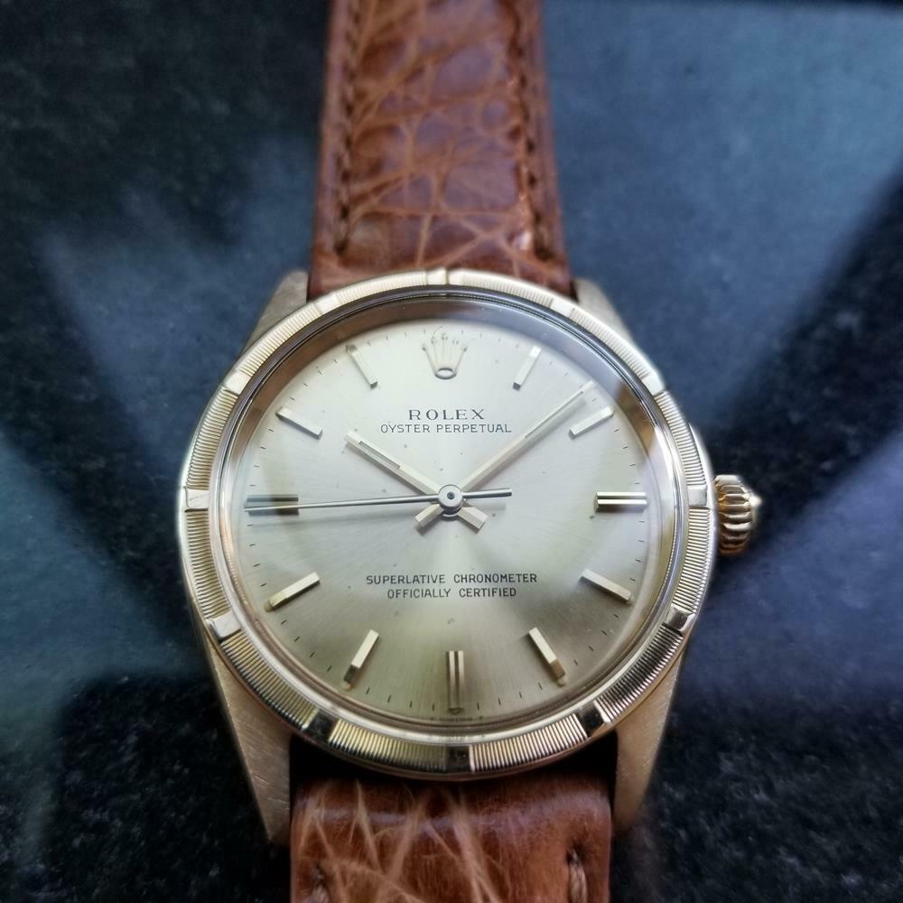 Timeless luxury, men's 18k solid gold Rolex Oyster Perpetual 1007 automatic, c.1967. Verified authentic by a master watchmaker. Gorgeous gold Rolex signed dial, applied gold indice hour markers, gold minute and hour hands, sweeping central second