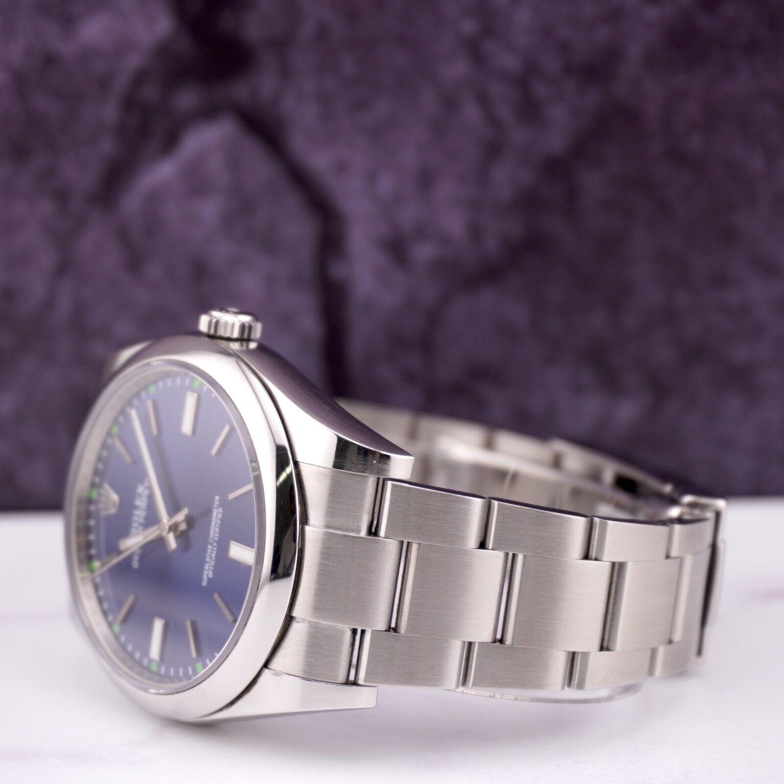 Women's or Men's Rolex Men's 39mm Oyster Perpetual Stainless Steel Blue Dial Watch Ref: 114300 For Sale