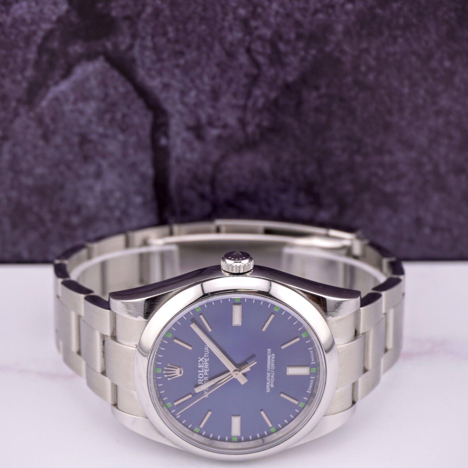 Rolex Men's 39mm Oyster Perpetual Stainless Steel Blue Dial Watch Ref: 114300 For Sale 3