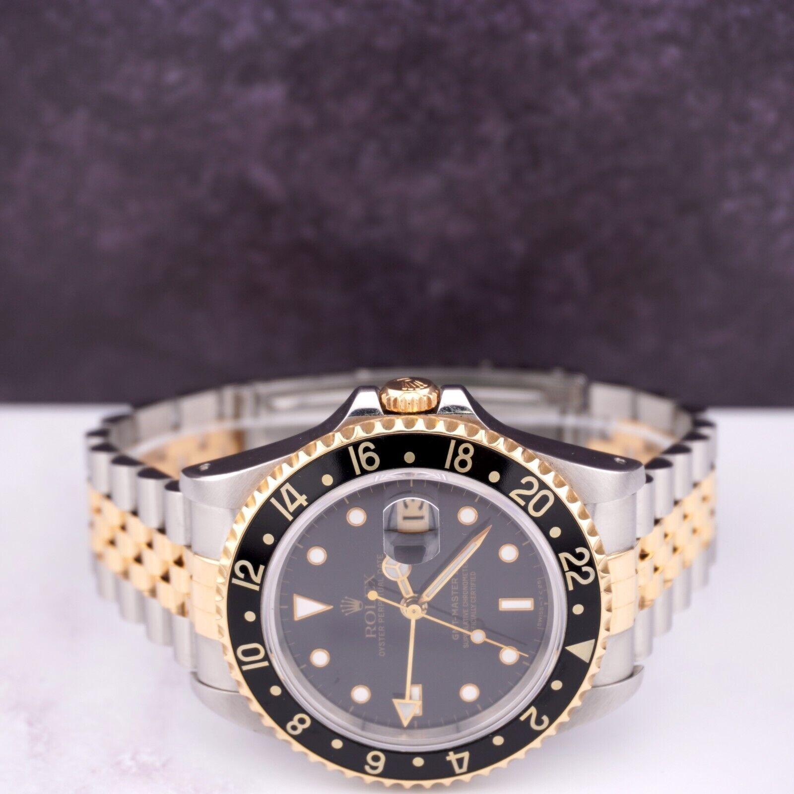 Modern Rolex Mens 40mm GMT-Master II 18k Yellow Gold/Steel Black Jubilee Watch 16713