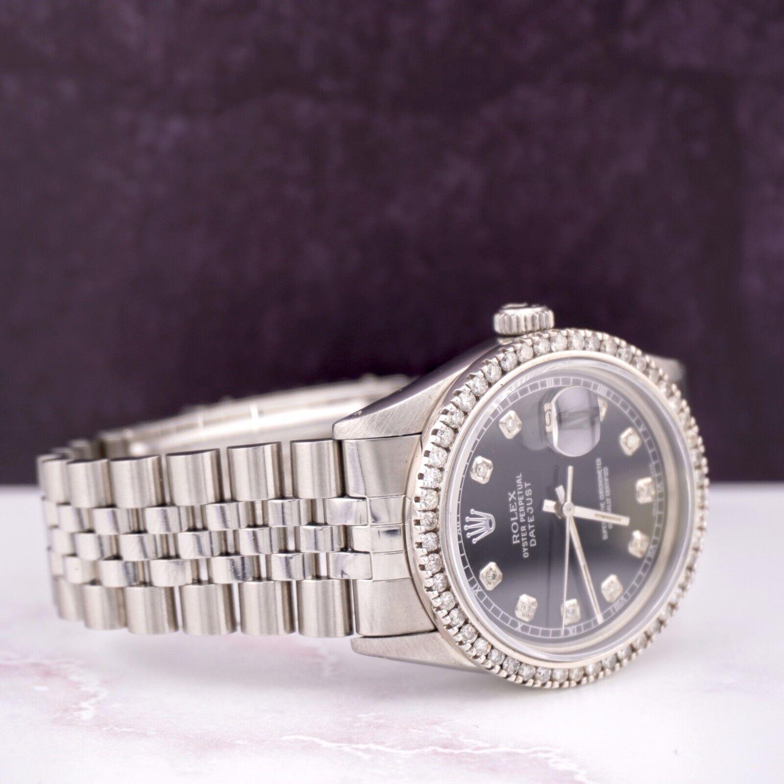 Rolex Datejust 36mm Watch. A Pre-owned watch w/ Gift Box. Watch is 100% Authentic and Comes with Authenticity Card. Watch Reference is 16014 and is in Excellent Condition (See Pictures). The dial color is Black and material is Stainless Steel. 2.5ct
