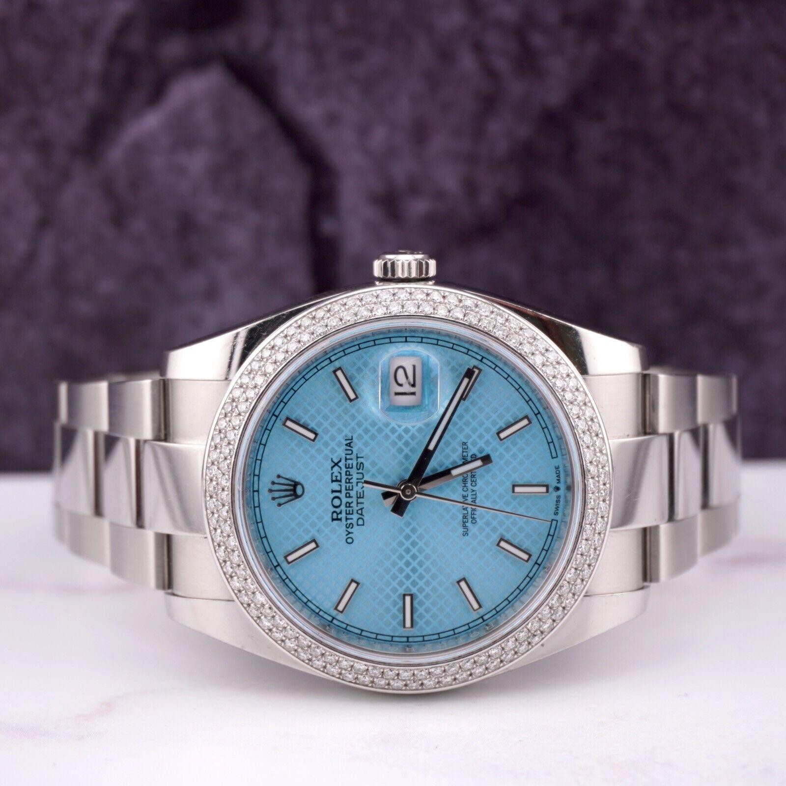Rolex Datejust 41mm Uhr. Ein Pre-owned Uhr w / Original Box. Uhr ist 100% authentisch und kommt mit Echtheitskarte. Watch Reference ist 126300 und ist in ausgezeichnetem Zustand (siehe Bilder). Die Farbe des Zifferblatts ist Eisblau und das MATERIAL