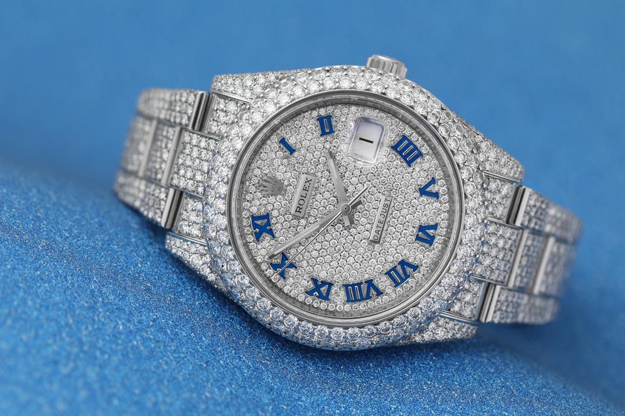 Rolex Herren Datejust 41mm Edelstahl voll Diamant Uhr mit römischen Ziffern Pave Zifferblatt 116300
 
Es gibt nur wenige Uhren, die zuverlässiger, vielseitiger und langlebiger sind als die Iced Out Rolex Datejust II 41MM 116300. Die Rolex Datejust