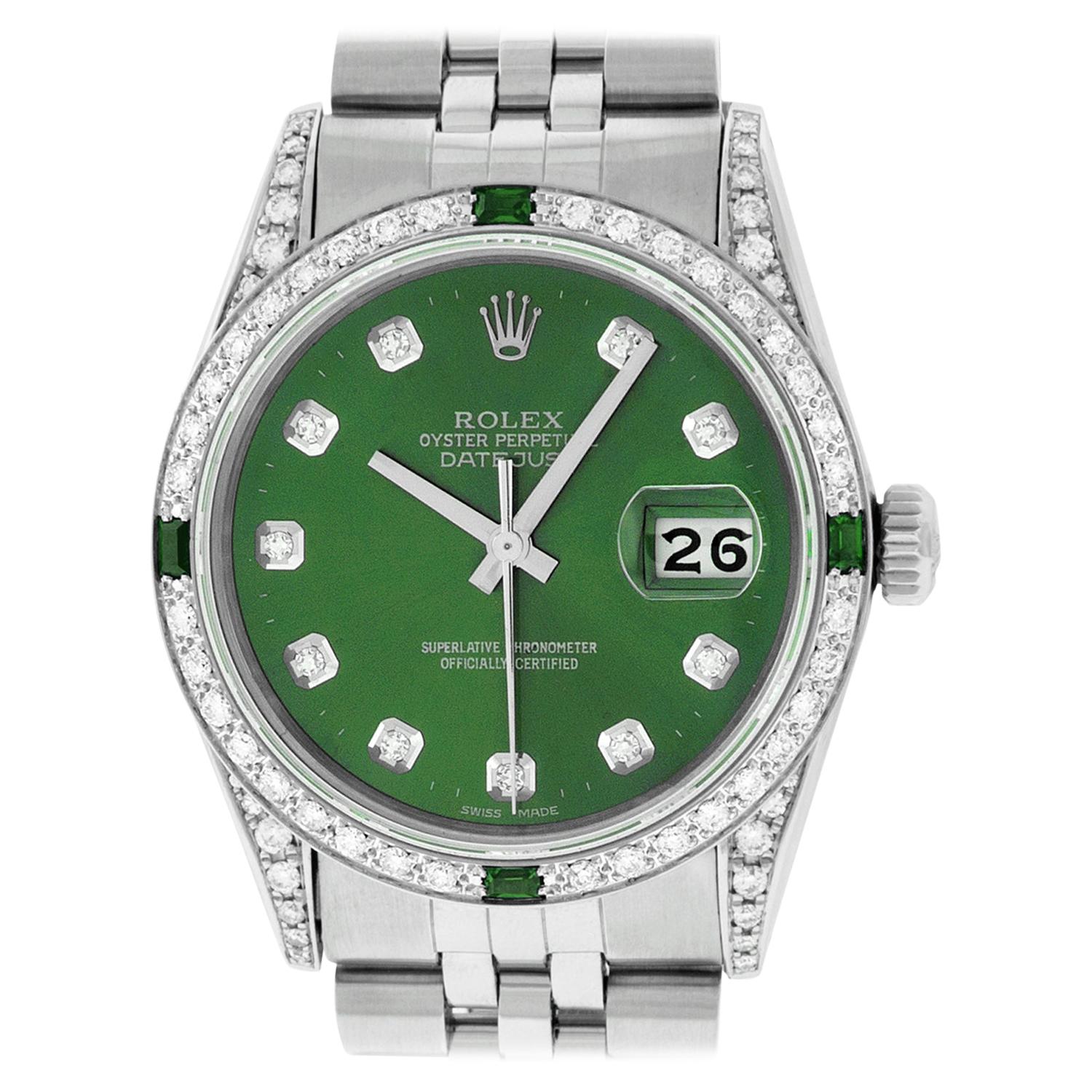 silver rolex with green face