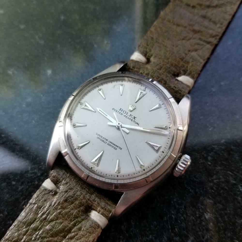 Timeless icon, men's rare Rolex Oyster Perpetual 6085 bubbleback automatic, c.1951. Verified authentic by a master watchmaker. Gorgeous aged silver Rolex signed dial, applied dagger hour markers, silver minute and hour hands, sweeping central second