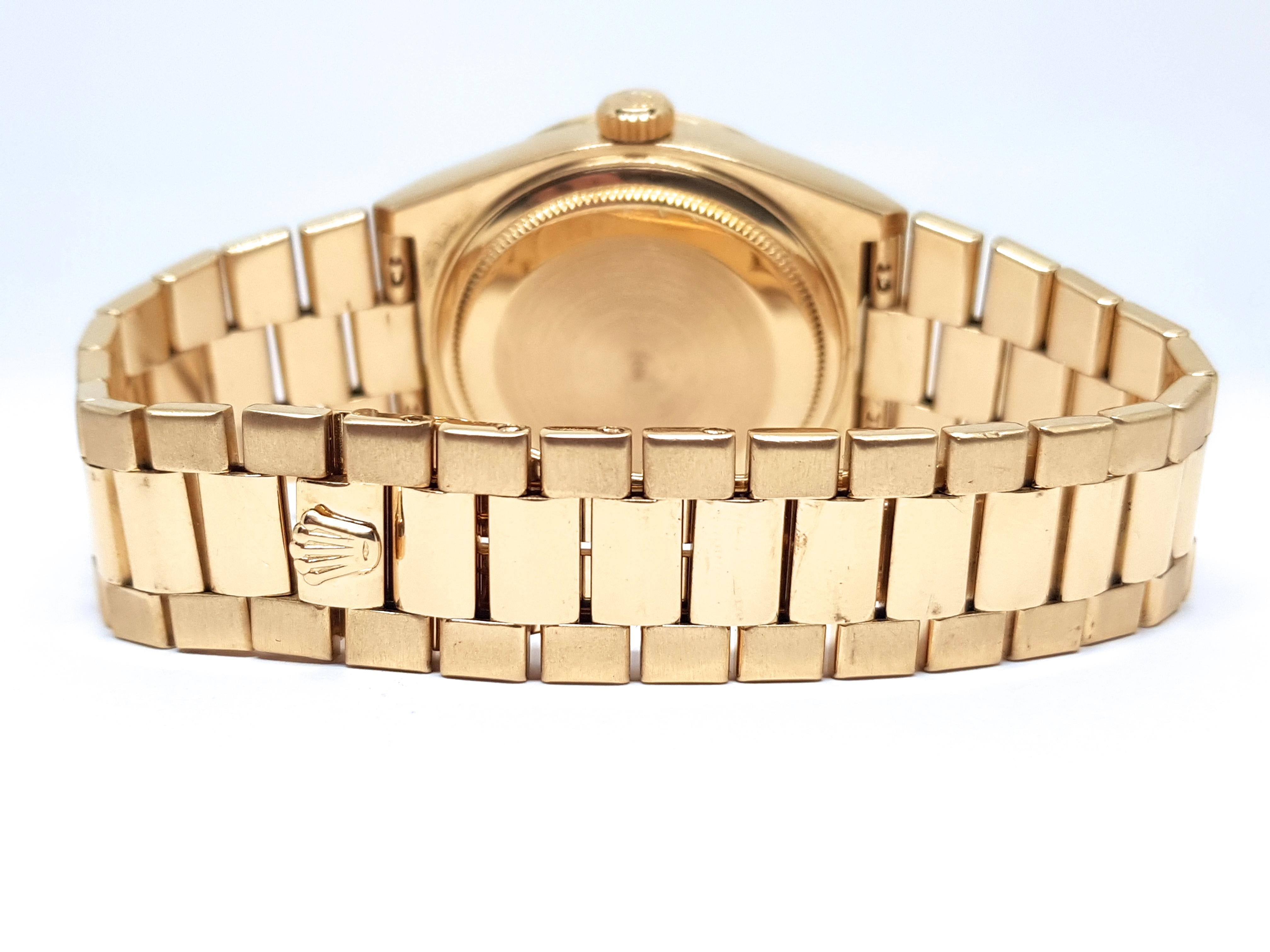 rolex day date gold