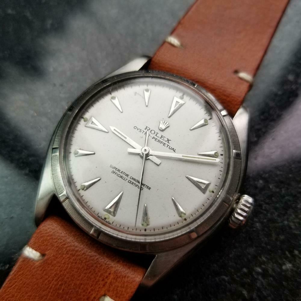 Iconic classic, rare men's Rolex Oyster Perpetual ref.6085 bubbleback automatic, c.1951. Verified authentic by a master watchmaker. Gorgeous aged silver Rolex signed dial, applied dagger hour markers, silver minute and hour hands, sweeping central