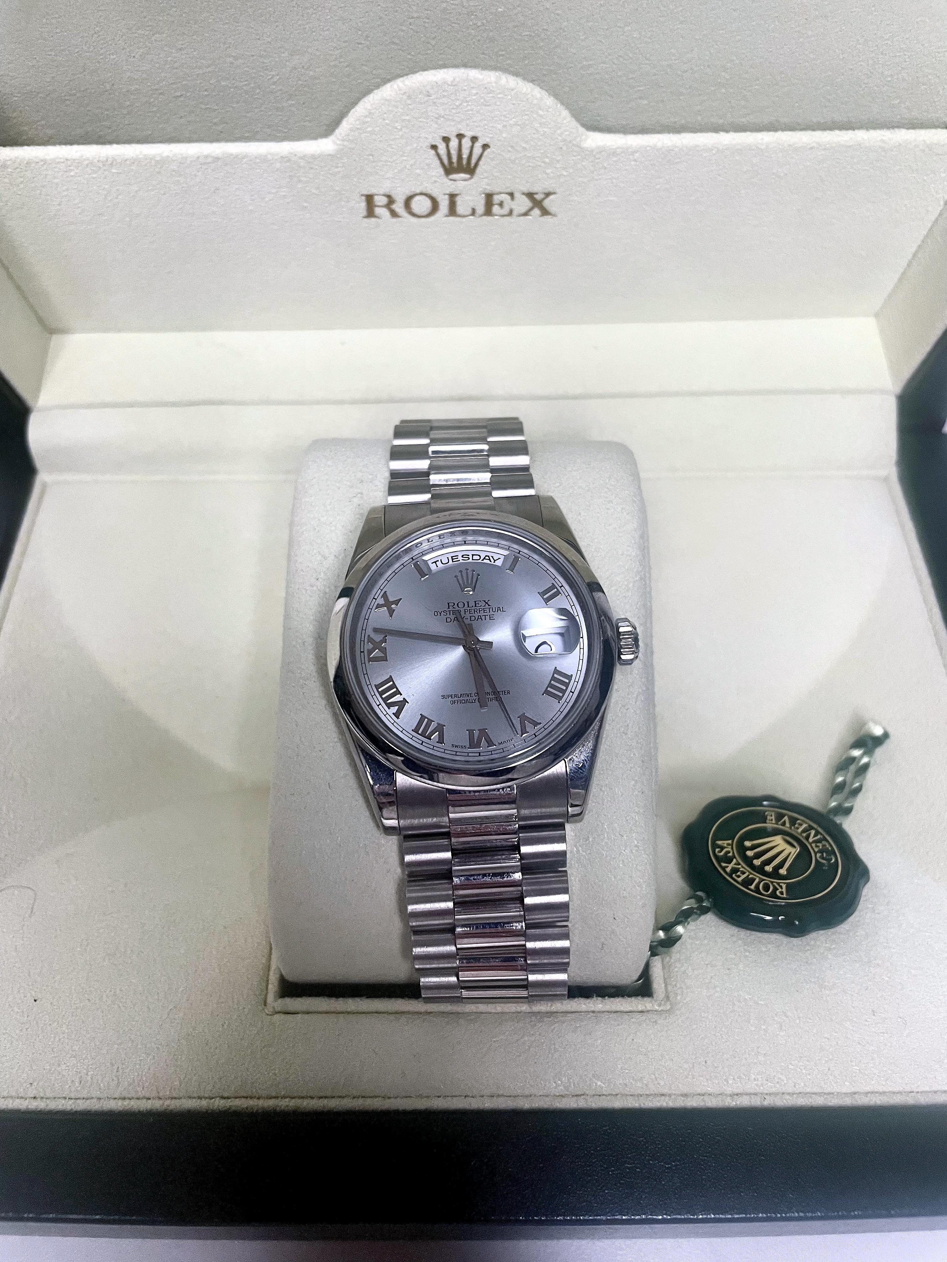 ROLEX MENS SOLID PLATINUM AND ICE BLUE DAY-DATE PRESIDENT WRISTWATCH

ITEM DESCRIPTION: 
This extremely rare Rolex President is guaranteed to make a statement.  This is the iconic Rolex President Day-Date Model In Platinum. This model is considered