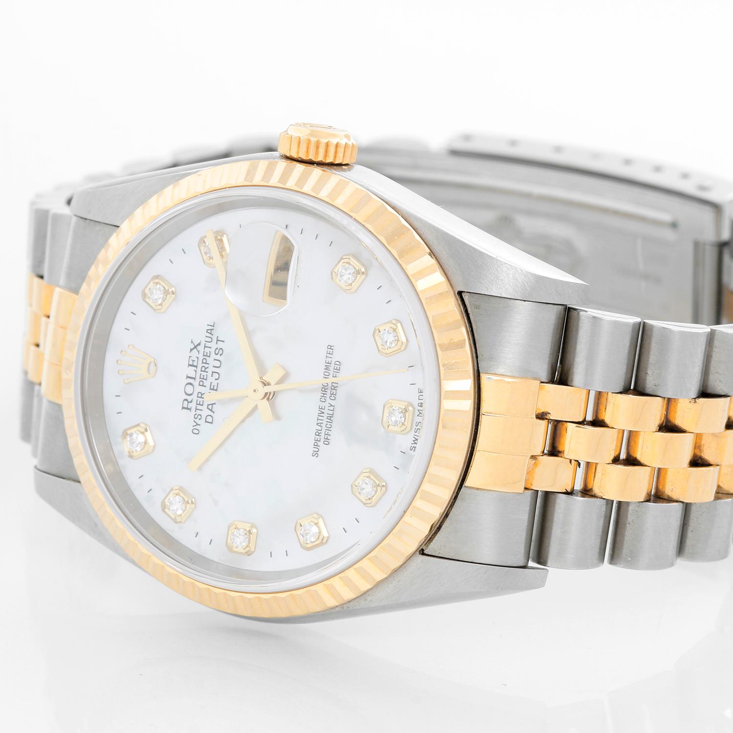 Rolex Men's Two Tone Datejust 16233 - Automatic winding, Quickset, sapphire crystal. Stainless steel case with yellow gold bezel (36mm diameter). Factory Mother of Pearl Diamond dial. Stainless steel and 18k yellow gold Jubilee bracelet. Pre-owned