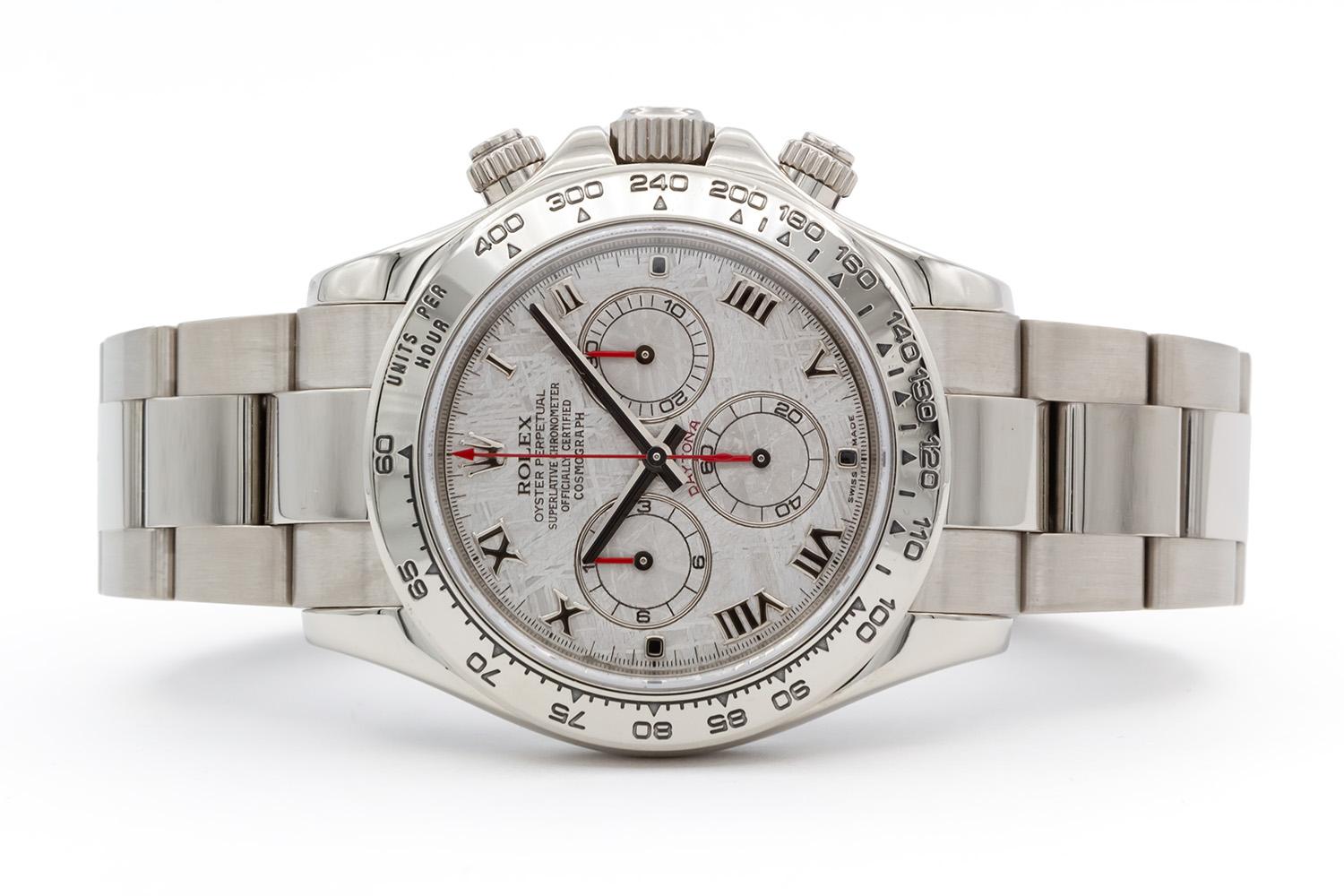 We are pleased to offer this 2006 18k White Gold Rolex Daytona Chronograph 116509. The Daytona will always be one of the most coveted Rolex watches and this configuration tops the charts for many collectors. It features the rare Rolex meteorite