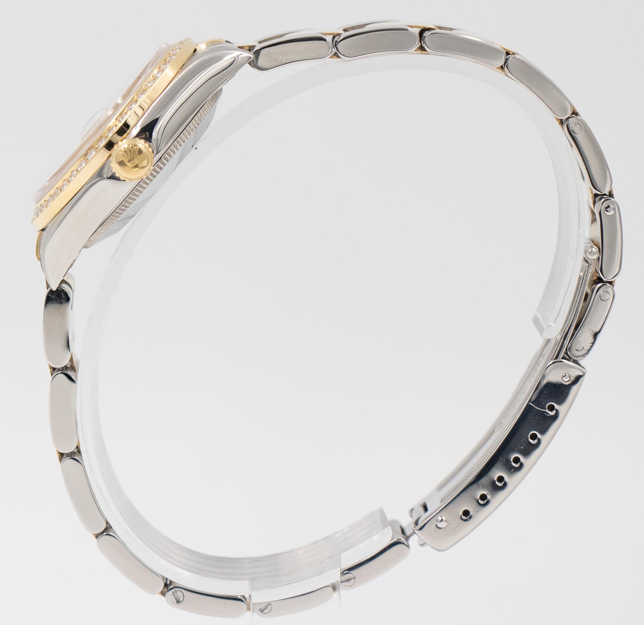 Women's Rolex Mid-Size DateJust 31 6243, circa 1995, Diamond and MOP Dial, 18k YG and SS