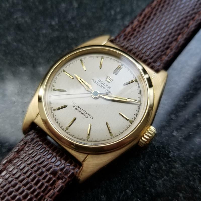 Timeless luxury, men's rare midsize 18K solid gold Rolex Oyster Perpetual 6050 bubble back automatic, c.1948. Verified authentic by a master watchmaker. Gorgeous, unrestored Rolex dial, applied gold dagger hour markers, gold minute and hour hands,