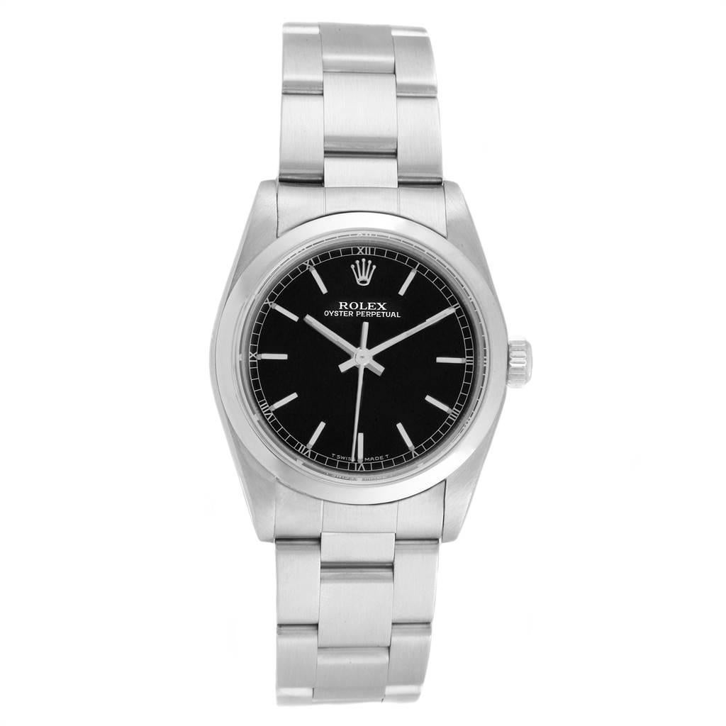 Rolex Midsize 31 Black Baton Dial Steel Ladies Watch 77080. Officially certified chronometer automatic self-winding movement. Stainless steel oyster case 31.0 mm in diameter. Rolex logo on a crown. Stainless steel smooth bezel. Scratch resistant
