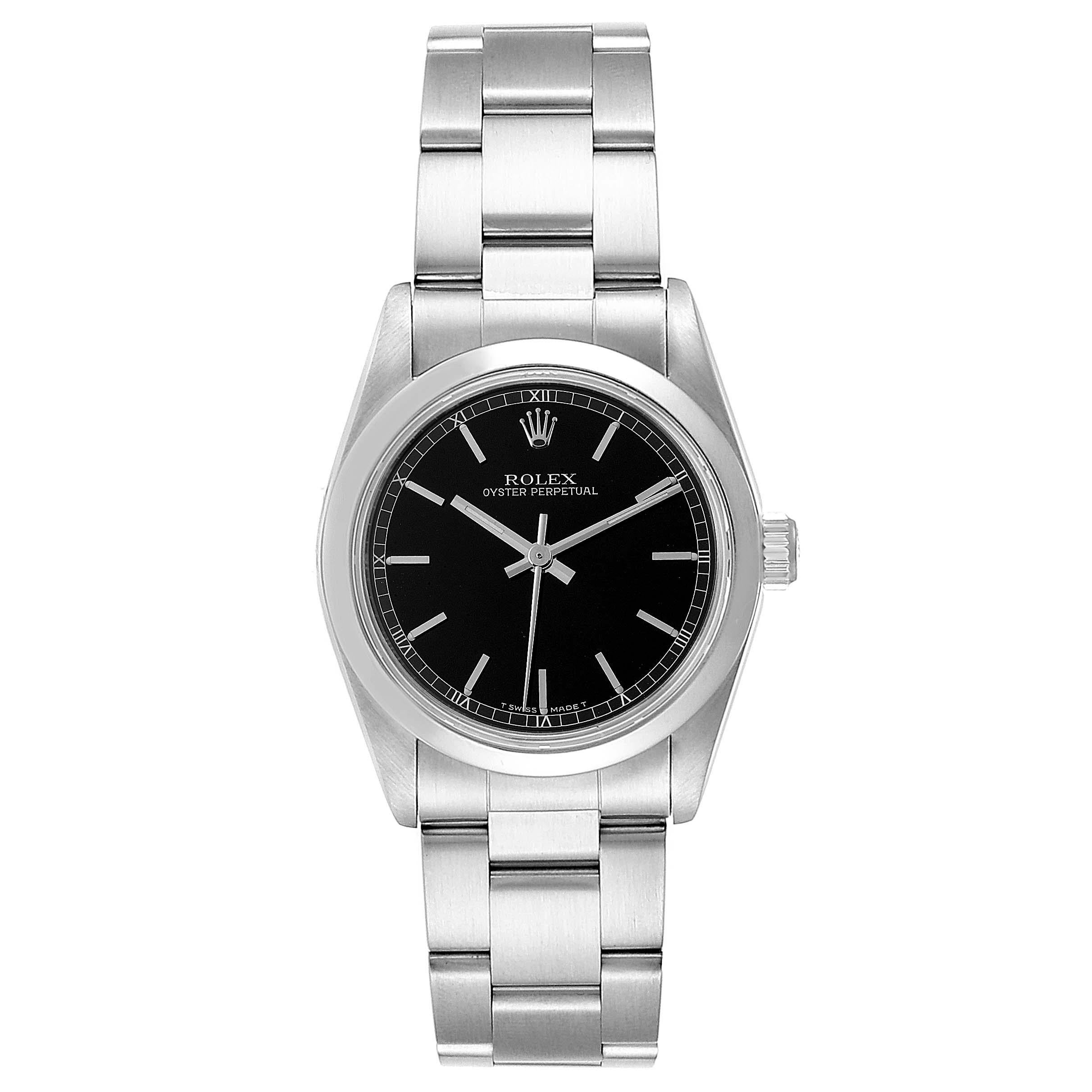 Rolex Midsize 31 Black Baton Dial Steel Ladies Watch 77080. Officially certified chronometer self-winding movement. Stainless steel oyster case 31.0 mm in diameter. Rolex logo on a crown. Stainless steel smooth bezel. Scratch resistant sapphire