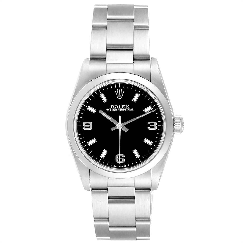 Rolex Midsize 31 Black Dial Domed Bezel Steel Ladies Watch 77080. Officially certified chronometer self-winding movement. Stainless steel oyster case 31.0 mm in diameter. Rolex logo on a crown. Stainless steel smooth bezel. Scratch resistant