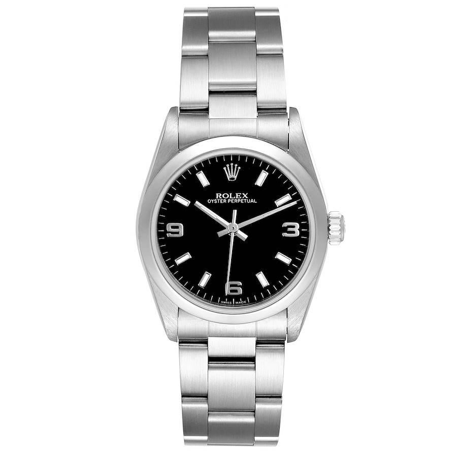 Rolex Midsize 31 Black Dial Domed Bezel Steel Ladies Watch 77080. Officially certified chronometer self-winding movement. Stainless steel oyster case 31.0 mm in diameter. Rolex logo on a crown. Stainless steel smooth bezel. Scratch resistant