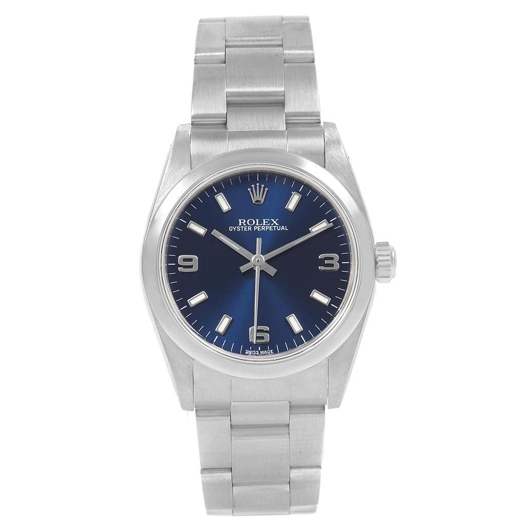 Rolex Midsize 31 Blue Dial Oyster Bracelet Steel Ladies Watch 77080. Officially certified chronometer self-winding movement. Stainless steel oyster case 31 mm in diameter. Rolex logo on a crown. Stainless steel smooth bezel. Scratch resistant