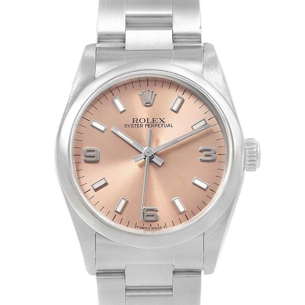 Rolex Midsize 31 Salmon Dial Oyster Bracelet Ladies Watch 67480. Automatic self-winding movement. Stainless steel oyster case 31.0 mm in diameter. Rolex logo on a crown. Stainless steel smooth bezel. Scratch resistant sapphire crystal. Salmon dial