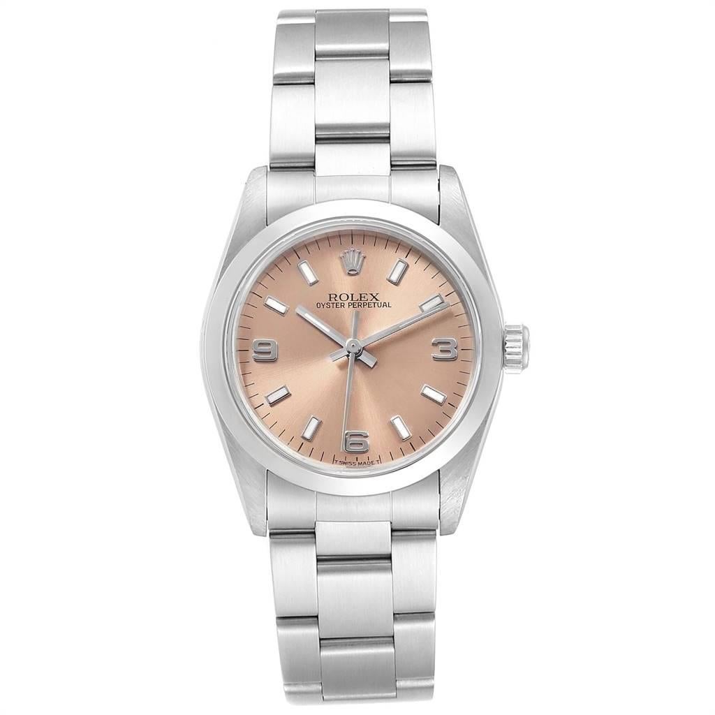 Rolex Midsize 31 Salmon Dial Oyster Bracelet Ladies Watch 67480. Automatic self-winding movement. Stainless steel oyster case 31.0 mm in diameter. Rolex logo on a crown. Stainless steel smooth bezel. Scratch resistant sapphire crystal. Salmon dial