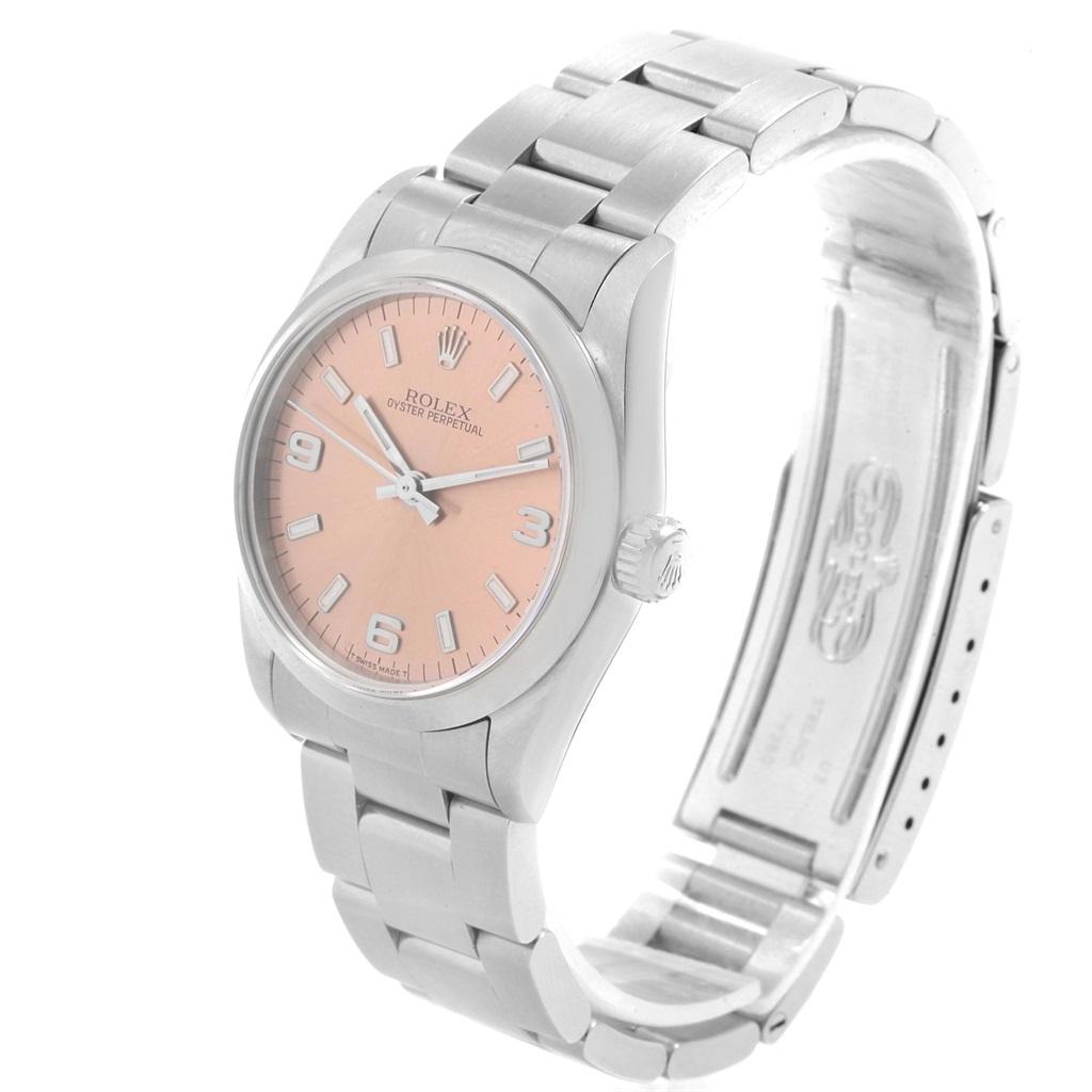 Rolex Midsize 31 Salmon Dial Oyster Bracelet Steel Ladies Watch 67480. Automatic self-winding movement. Stainless steel oyster case 31.0 mm in diameter. Rolex logo on a crown. Stainless steel smooth bezel. Scratch resistant sapphire crystal. Salmon