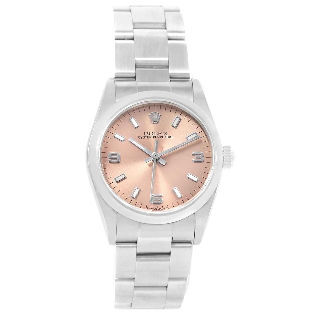 Rolex Midsize 31 Salmon Dial Oyster Bracelet Steel Ladies Watch 67480. Automatic self-winding movement. Stainless steel oyster case 31.0 mm in diameter. Rolex logo on a crown. Stainless steel smooth bezel. Scratch resistant sapphire crystal. Salmon
