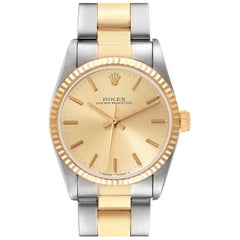 Rolex Midsize 31 Steel Yellow Gold Fluted Bezel Ladies Watch 67513 Rolex Midsize 31 Steel Yellow Gold Fluted Bezel Ladies Watch 67513