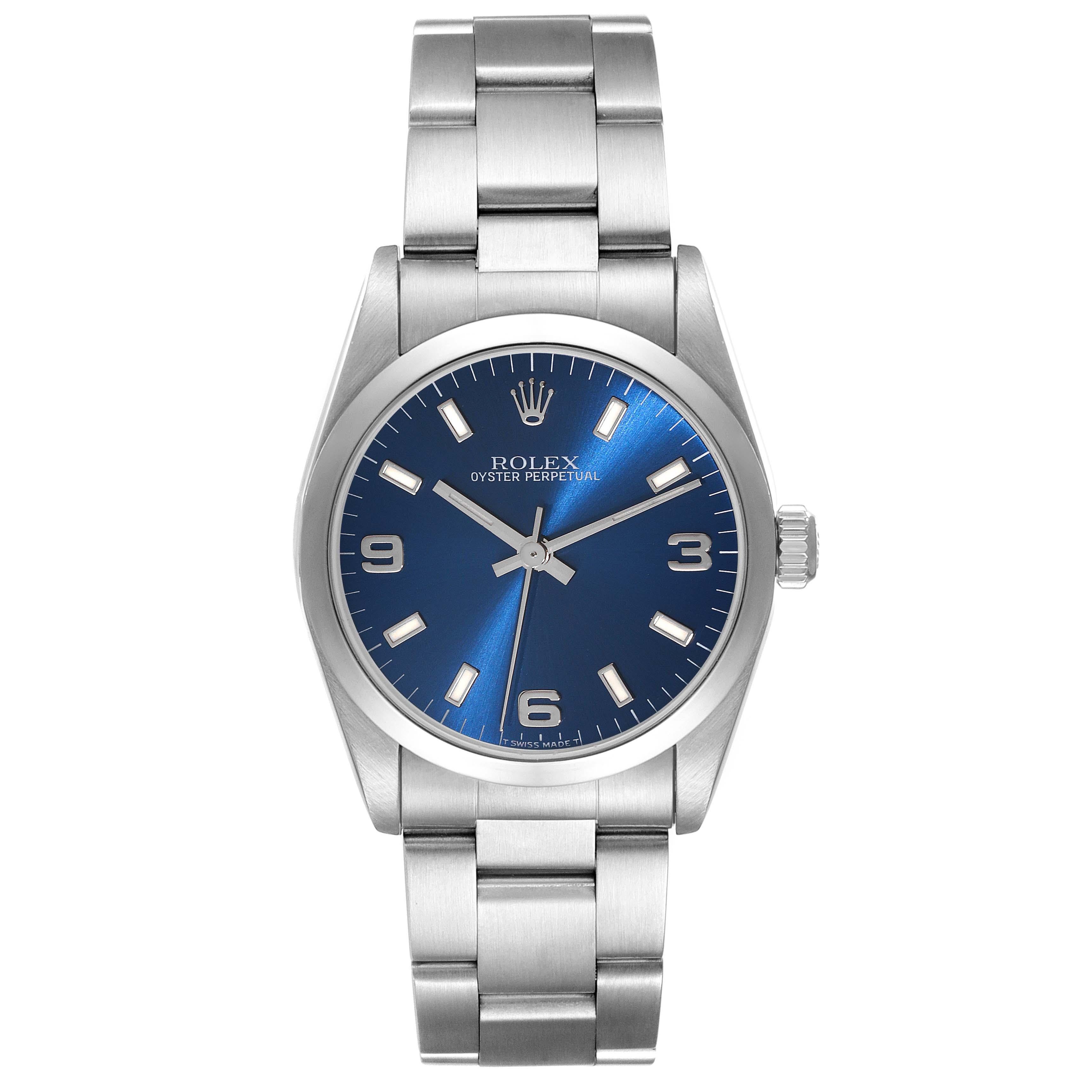 Rolex Midsize 31mm Blue Dial Automatic Steel Ladies Watch 67480 Box Papers. Automatic self-winding movement. Stainless steel oyster case 31.0 mm in diameter. Rolex logo on the crown. Stainless steel smooth bezel. Scratch resistant sapphire crystal.