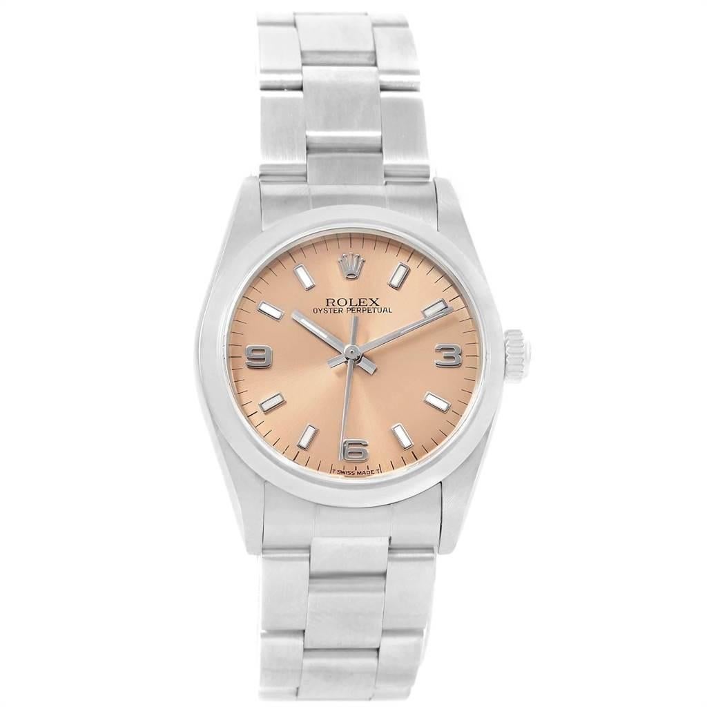 Rolex Midsize 31mm Salmon Dial Automatic Steel Ladies Watch 67480. Officially certified chronometer automatic self-winding movement. Stainless steel oyster case 31.0 mm in diameter. Rolex logo on a crown. Stainless steel smooth bezel. Scratch