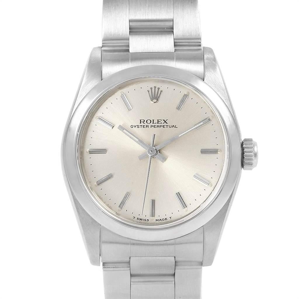 Rolex Midsize 31mm White Dial Automatic Steel Ladies Watch 67480. Automatic self-winding movement. Stainless steel oyster case 31.0 mm in diameter. Rolex logo on a crown. Stainless steel smooth bezel. Scratch resistant sapphire crystal. Silver dial