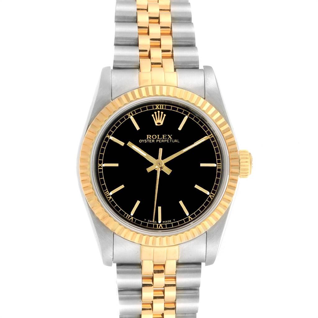 Rolex Midsize 31mm Yellow Gold Steel Black Dial Ladies Watch 67513. Officially certified chronometer self-winding movement. Stainless steel and 18K yellow gold round case 31 mm in diameter. Rolex logo on a crown. 18K yellow gold fluted bezel.