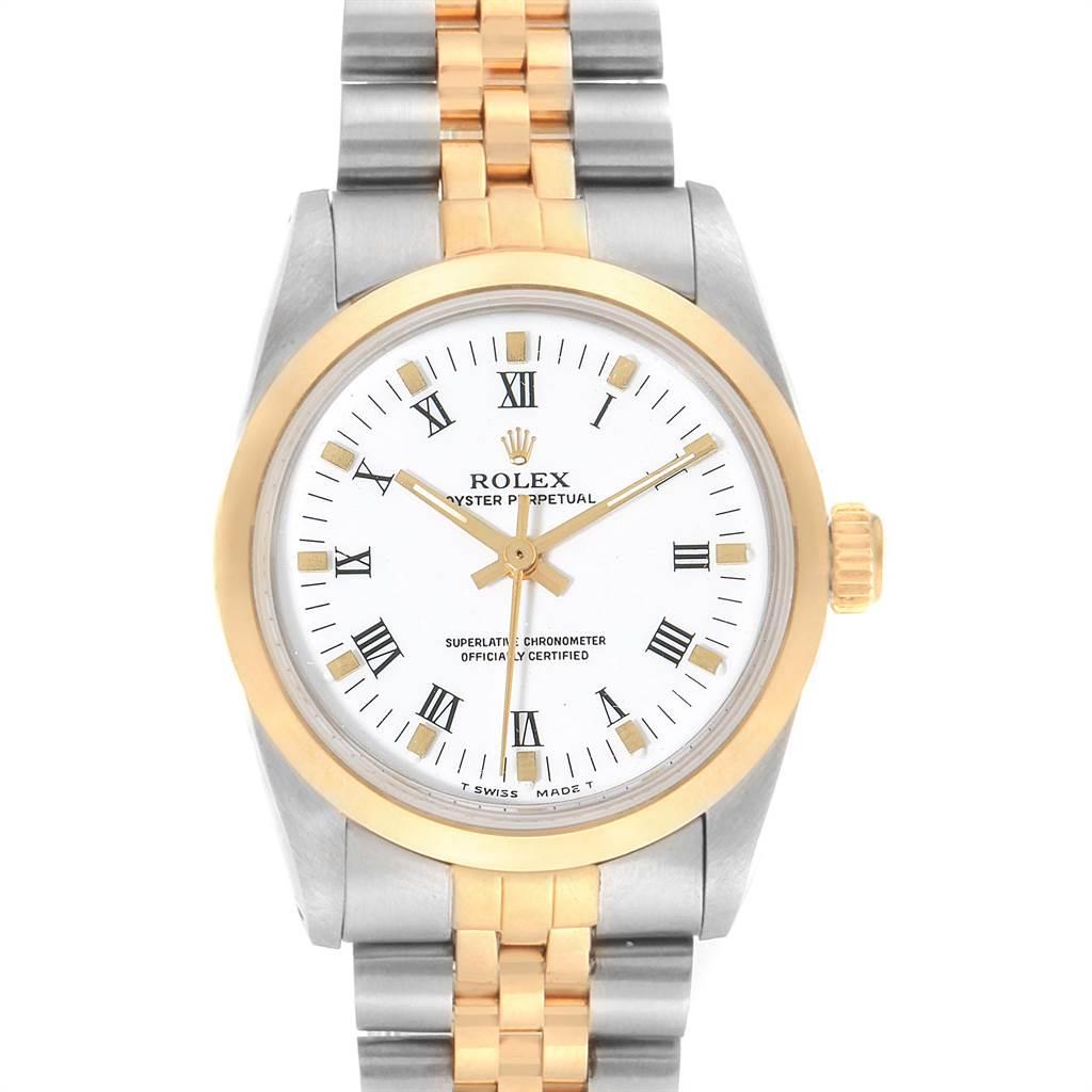 Rolex Midsize 31mm Yellow Gold Steel White Dial Ladies Watch 67513. Officially certified chronometer self-winding movement. Stainless steel and 18K yellow gold round case 31 mm in diameter. Rolex logo on a crown. 18K yellow gold fluted bezel.