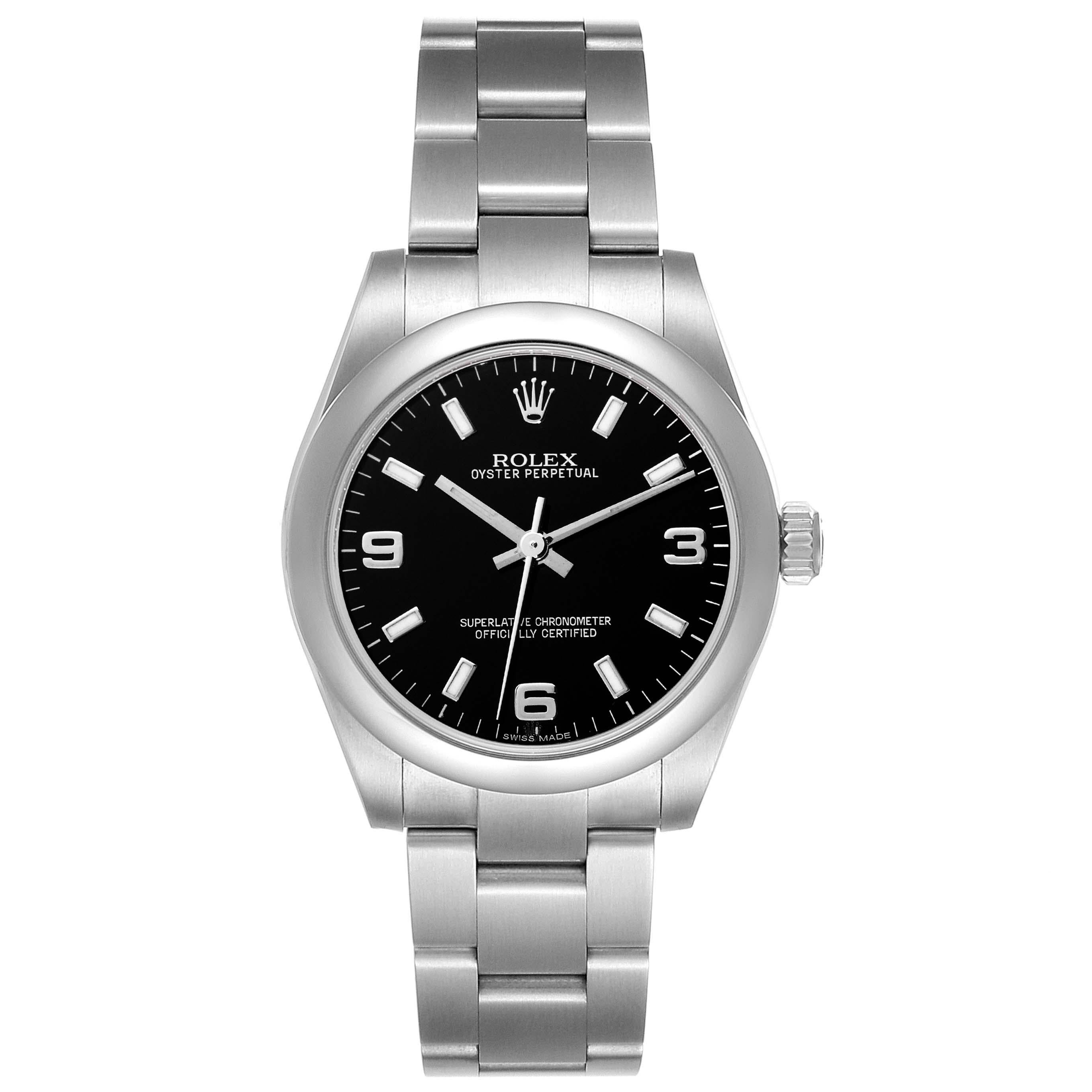 Rolex Midsize Black Dial Domed Bezel Steel Ladies Watch 177200. Officially certified chronometer self-winding movement with quickset date function. Stainless steel oyster case 31.0 mm in diameter. Rolex logo on a crown. Stainless steel smooth domed