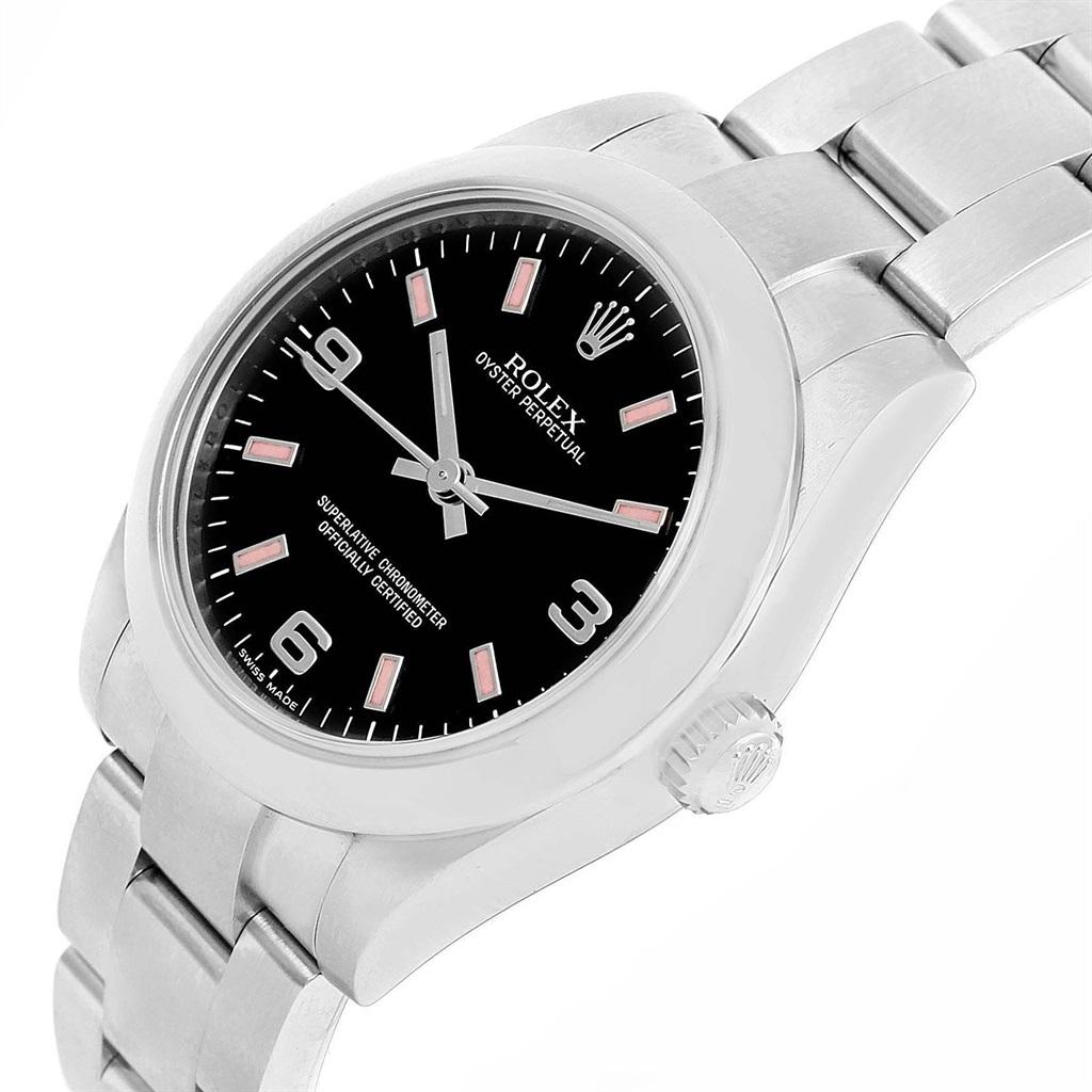 Rolex Midsize Black Dial Pink Hour Markers Ladies Watch 177200. Officially certified chronometer automatic self-winding movement. Stainless steel oyster case 31.0 mm in diameter. Rolex logo on a crown. Stainless steel smooth bezel. Scratch resistant