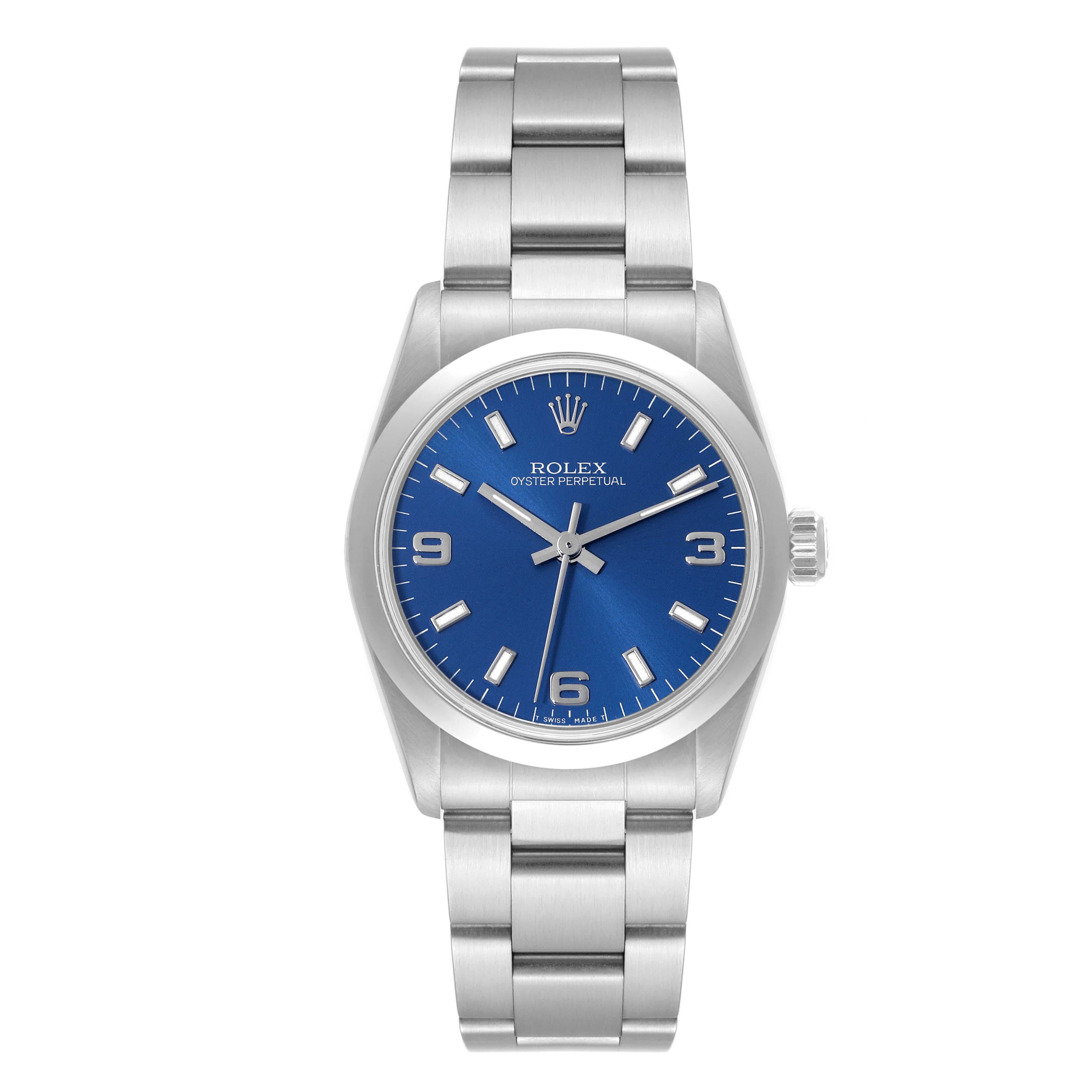 Rolex Midsize Blue Dial Automatic Steel Ladies Watch 67480 Box Papers. Automatic self-winding movement. Stainless steel oyster case 31.0 mm in diameter. Rolex logo on the crown. Stainless steel smooth bezel. Scratch resistant sapphire crystal. Blue