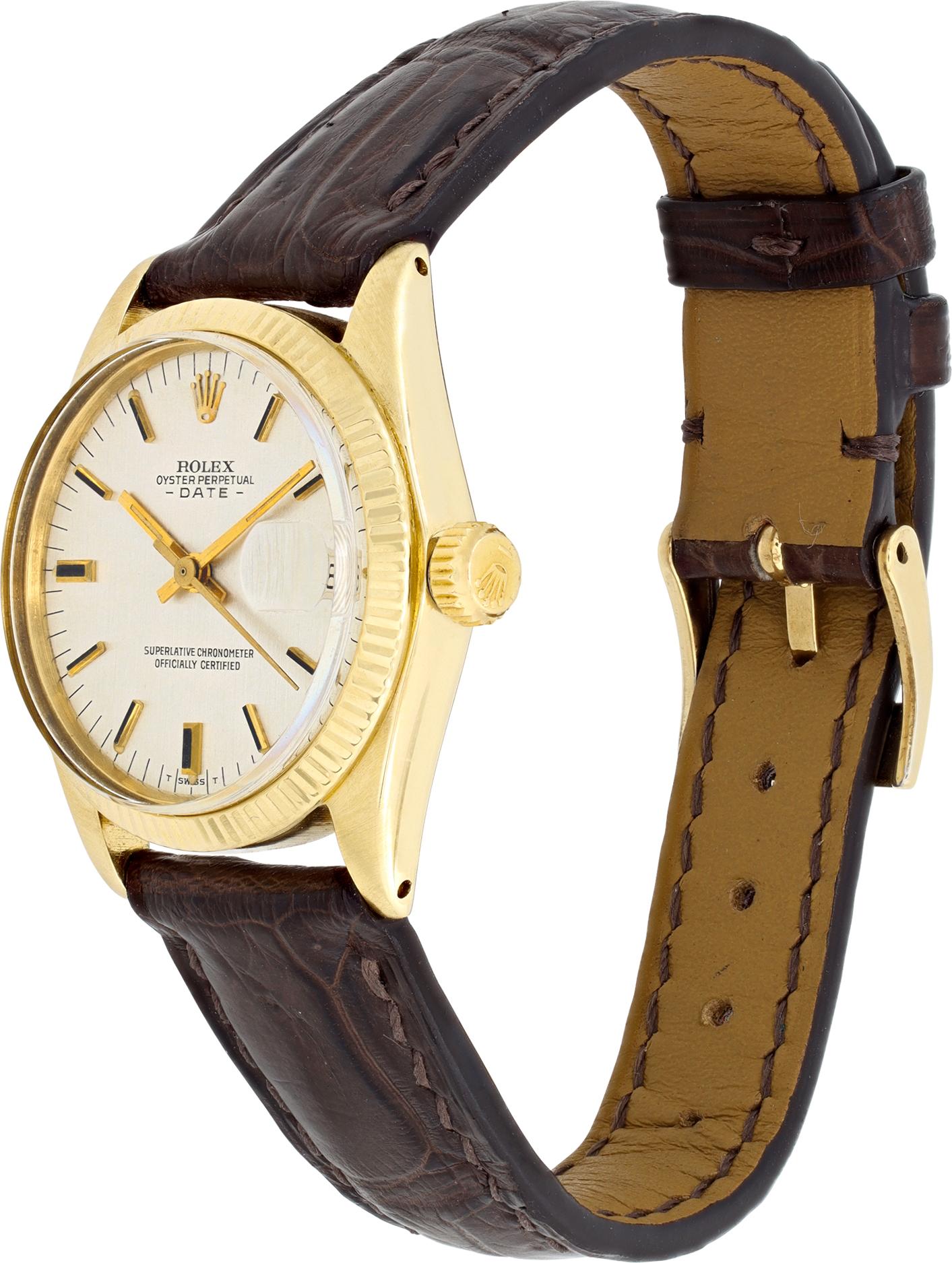 Midsize Rolex Date in 14k yellow gold on a custom brown alligator strap with a custom tang buckle. Auto w/ date. 30 mm case size. With box. Circa 1973. Ref 6827.**Bank Wire At This Price Only** Fine Pre-owned Rolex Watch.

 Certified preowned