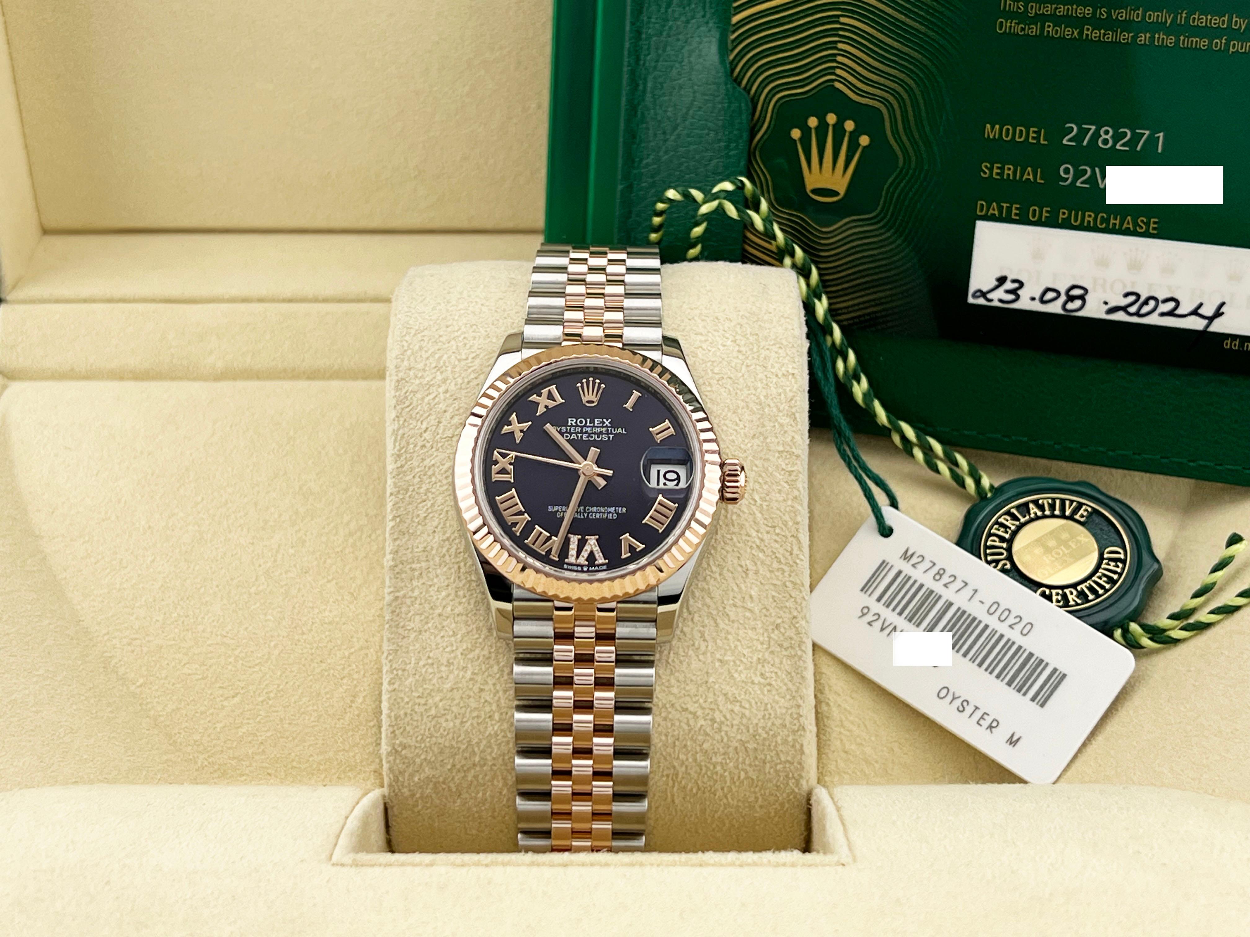 Style Number: 278271




Serial: 92VN7***



Year: 2024

 

Model: Rolex Datejust Midsize

 

Case Material: Stainless Steel 

 

Band: 18K Rose Gold & Stainless Steel 

  

Bezel: 18K Rose Gold 

  

Dial: Factory Aubergine Purple Diamond VI Roman
