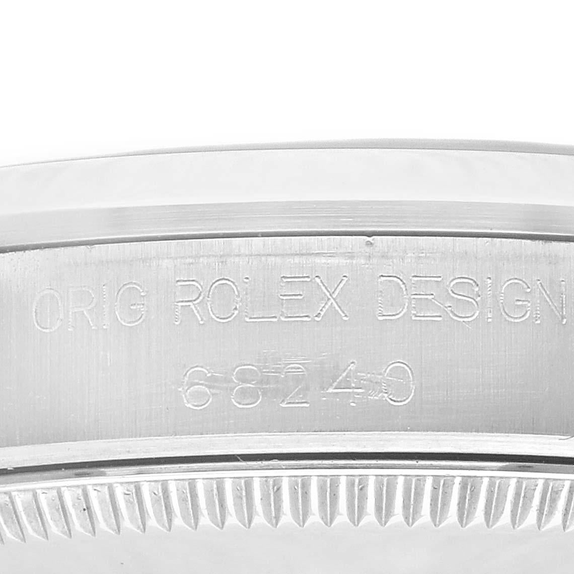 Rolex Midsize Datejust 31 Grey Anniversary Dial Steel Damenuhr 68240. Offiziell zertifiziertes Chronometerwerk mit automatischem Aufzug. Austerngehäuse aus Edelstahl mit einem Durchmesser von 31 mm. Rolex Logo auf einer Krone. Glatte Lünette aus