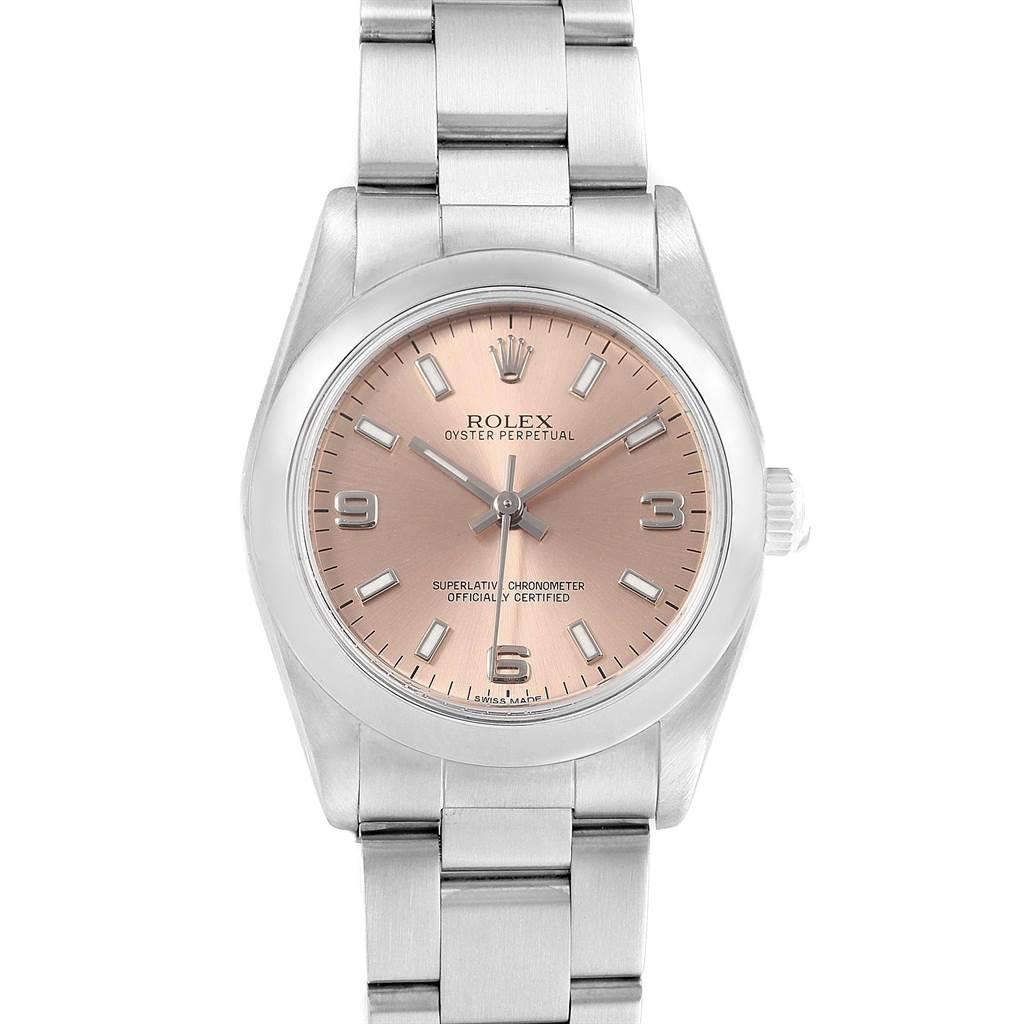 Rolex Midsize Salmon Dial Smooth Bezel Steel Ladies Watch 77080. Officially certified chronometer automatic self-winding movement. Stainless steel oyster case 31.0 mm in diameter. Rolex logo on a crown. Stainless steel smooth bezel. Scratch