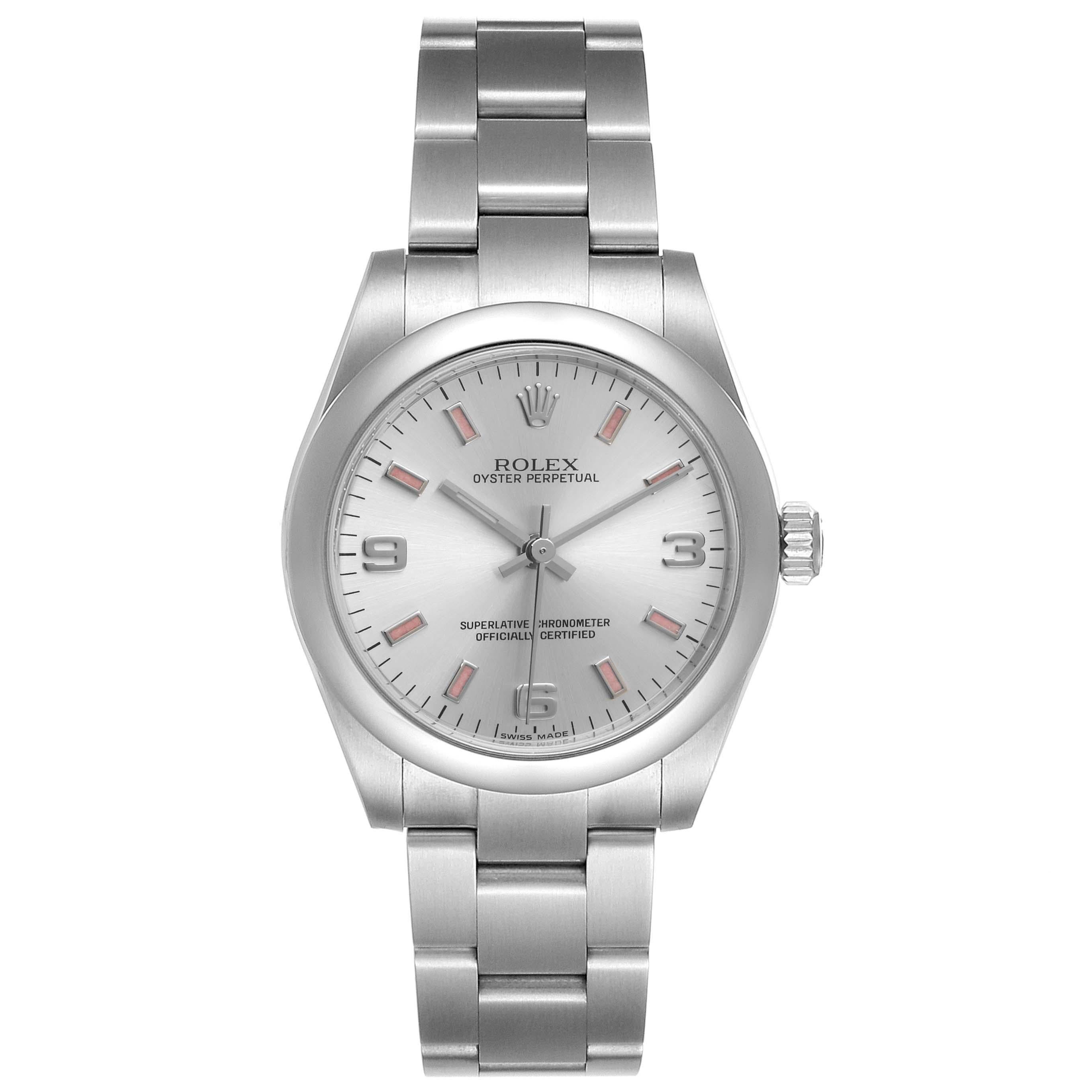 Rolex Midsize Silver Dial Pink Hour Markers Ladies Watch 177200. Officially certified chronometer self-winding movement with quickset date function. Stainless steel oyster case 31.0 mm in diameter. Rolex logo on a crown. Stainless steel smooth